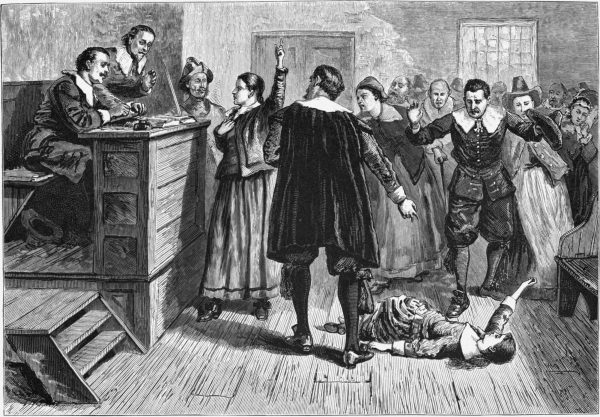 Engraving of people in a courtroom.
